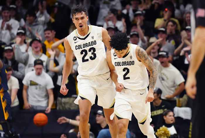 Colorado Buffaloes forward Tristan da Silva (23) celebrates with guard KJ Simpson (2) in the first half against the California Golden Bears at the CU Events Center
